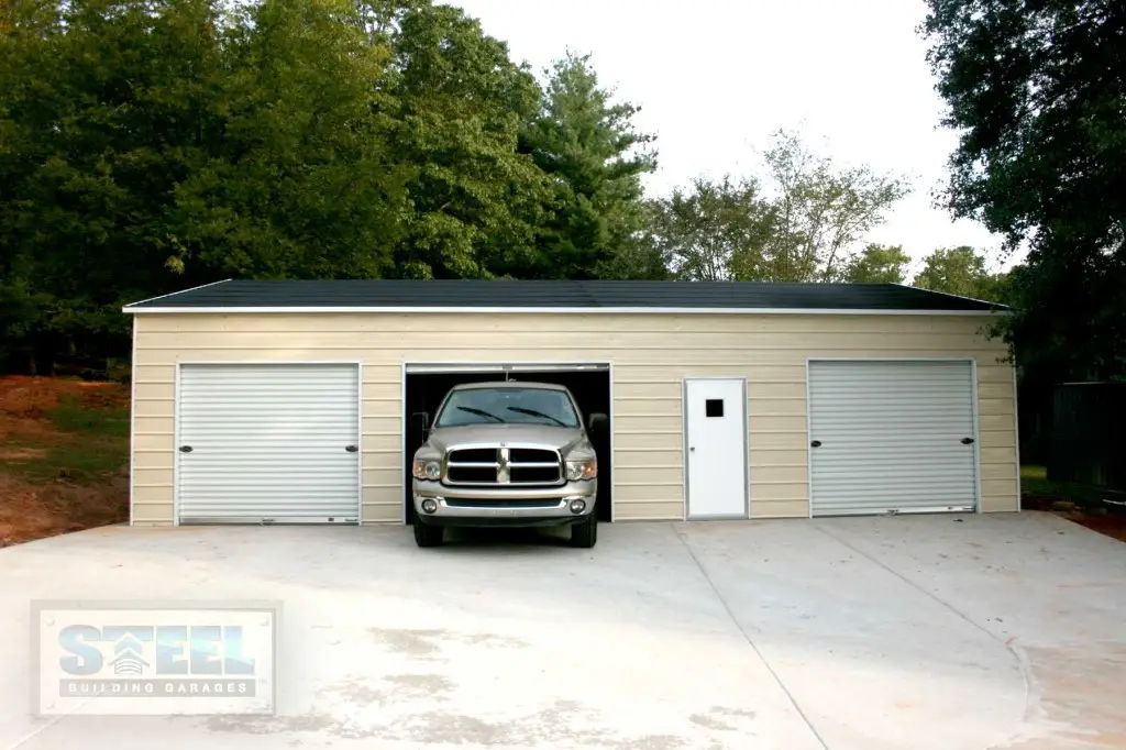 Three car metal garage building.