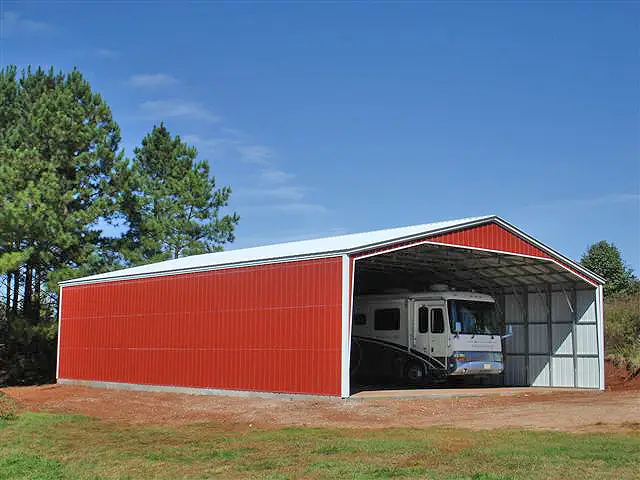 Wide metal garage large enough for recreational vehicle